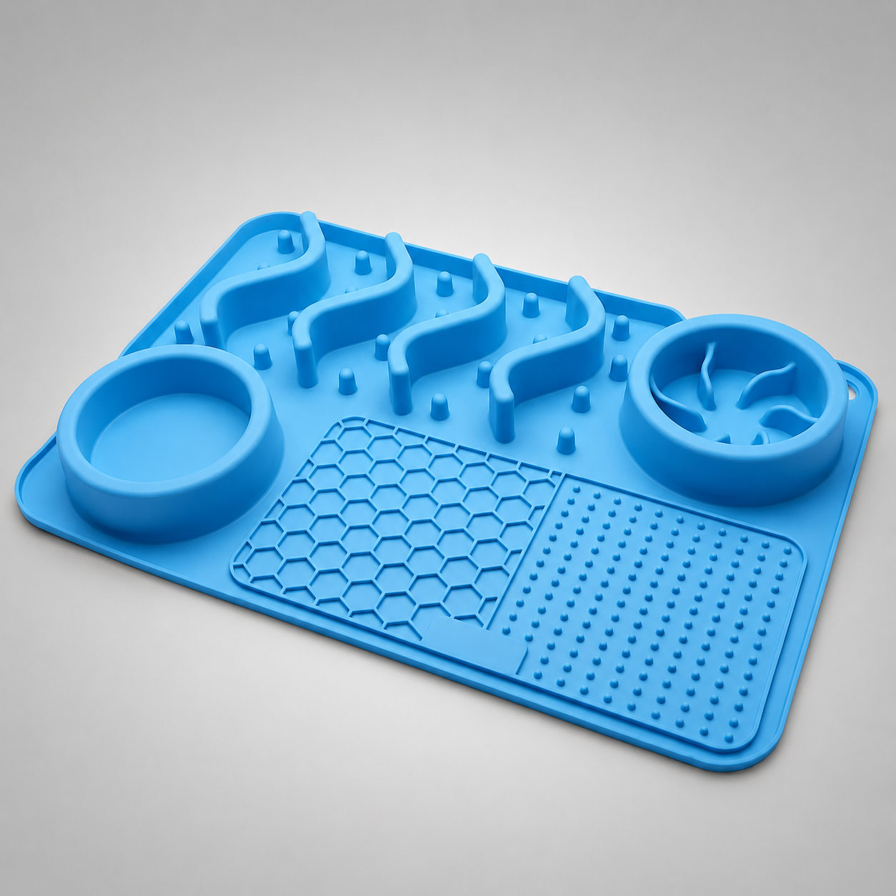 Blue silicone mat with two bowl holders on a grey background