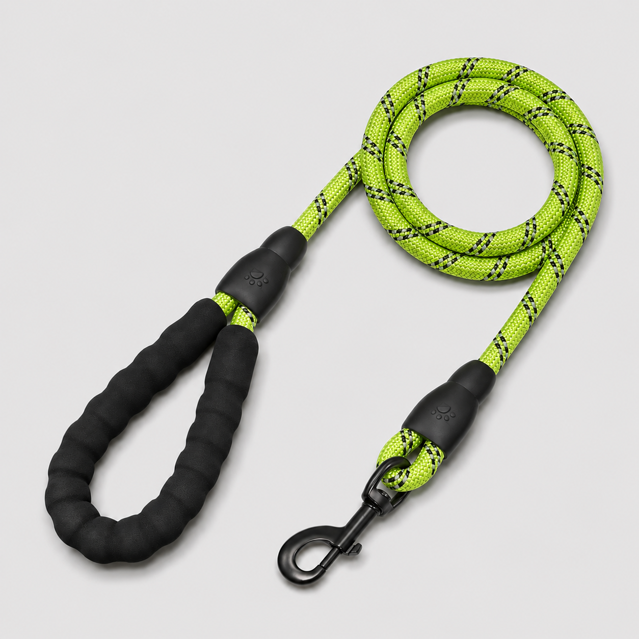 Dog leash with green and black pattern on a light gray background