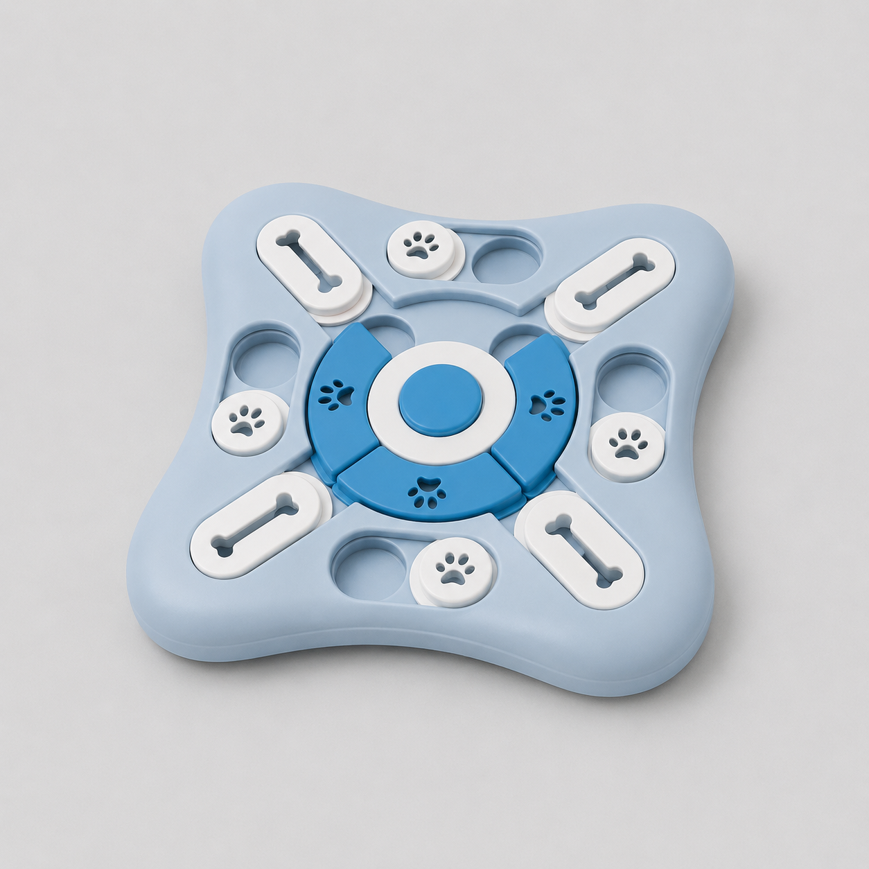 Blue and white puzzle toy for dogs on a grey background