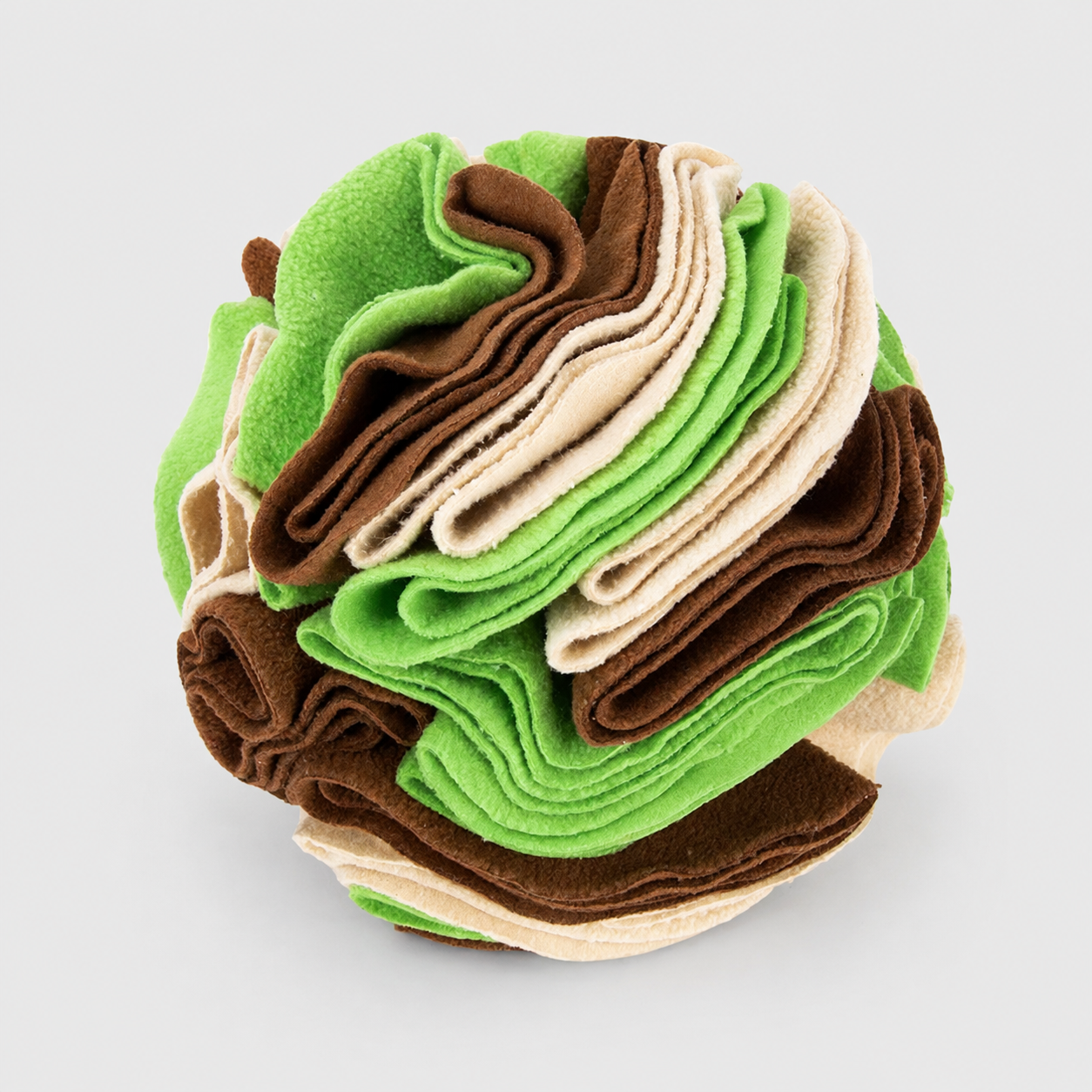Stack of green, brown, and beige felt fabric squares on a light grey background