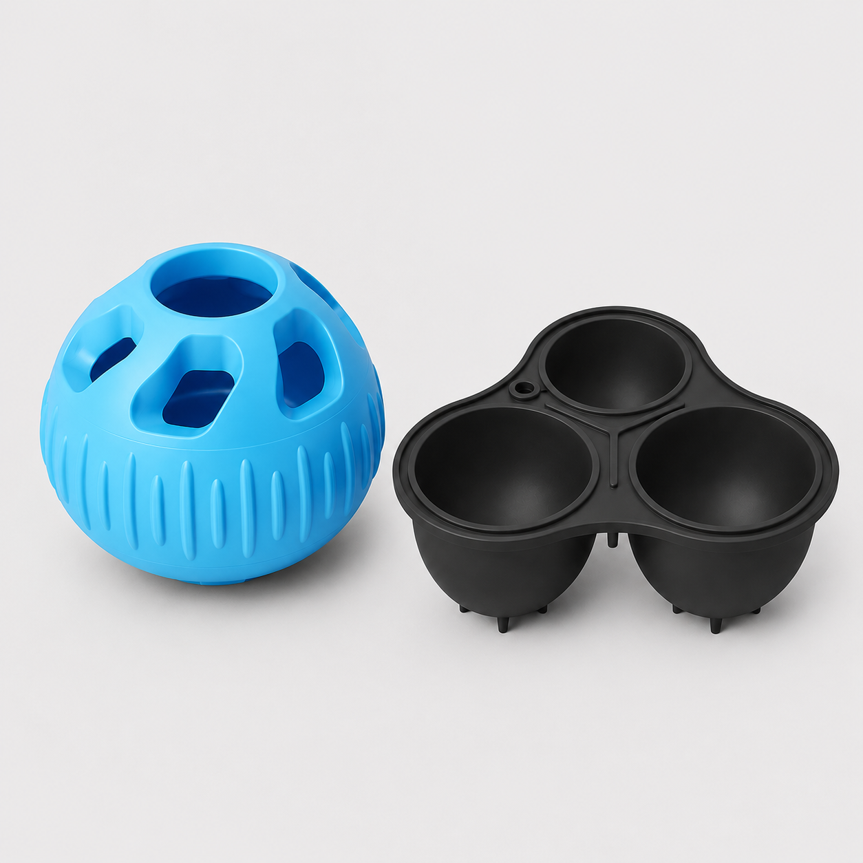 Pawmate Chill'n Lick Cyan textured ball and charcoal three-compartment mould on a light grey background