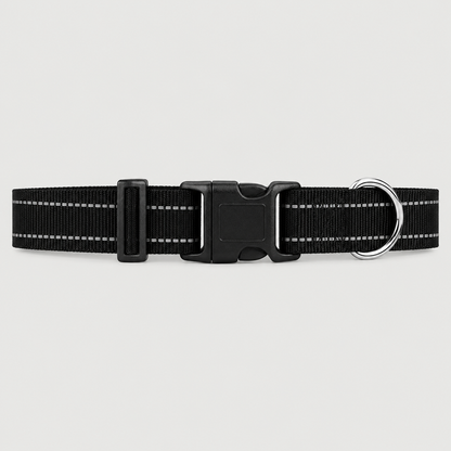 Black dog collar with reflective strip on a light grey background