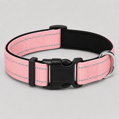 Pink dog collar with reflective stripes on a light grey background