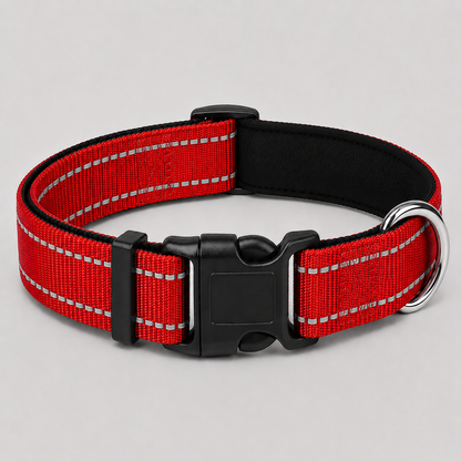 Red dog collar with reflective stripes on a light grey background