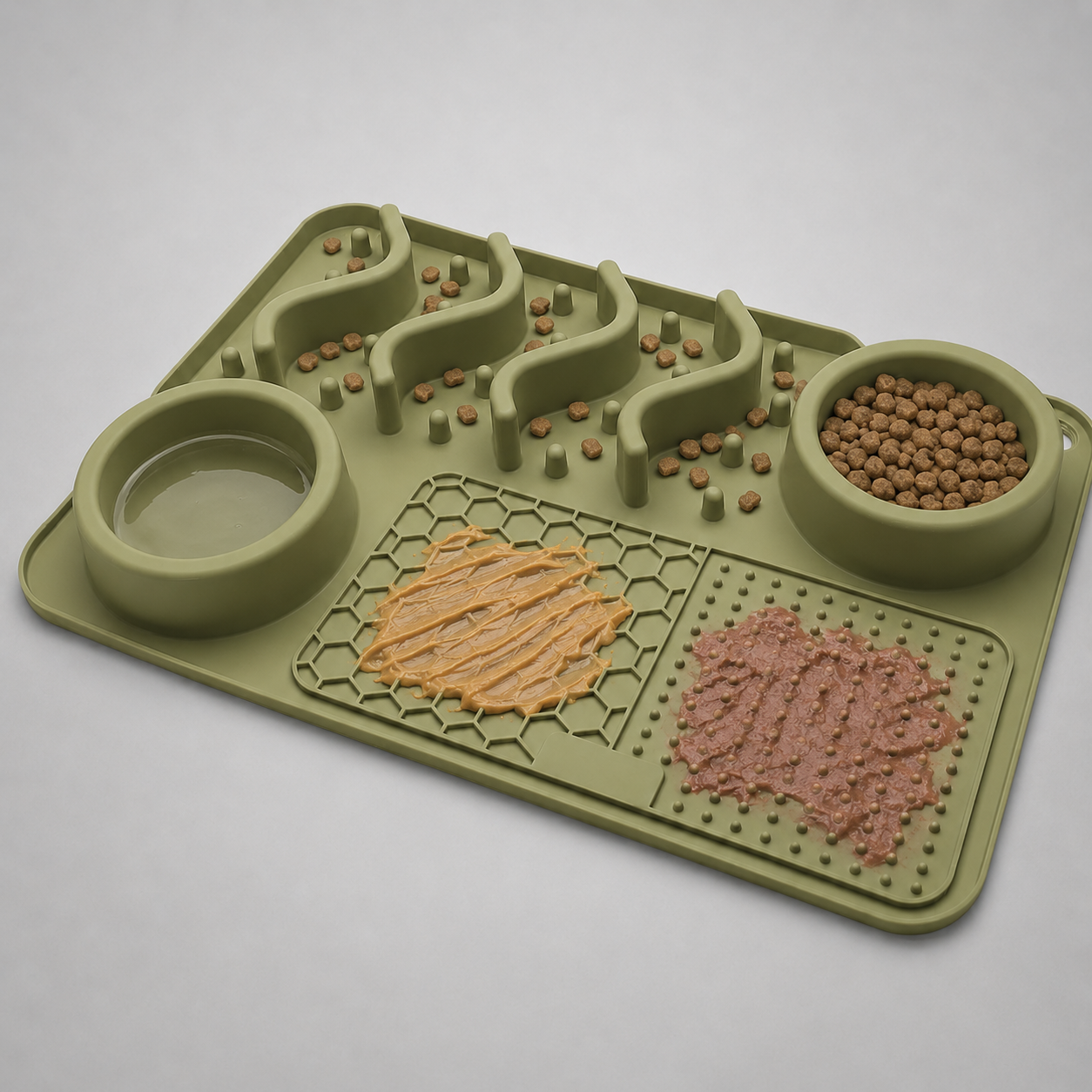 Green pet feeding mat with two bowls and food on a light grey background