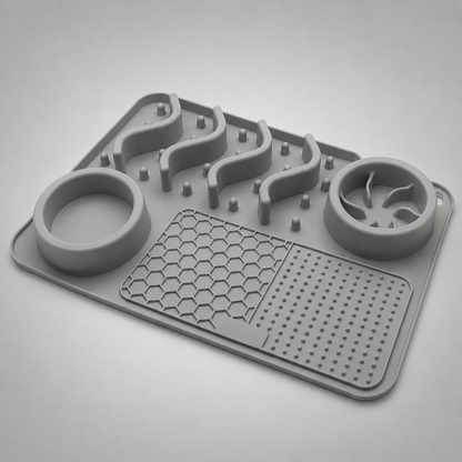 Grey silicone mat with various textured sections on a light grey background