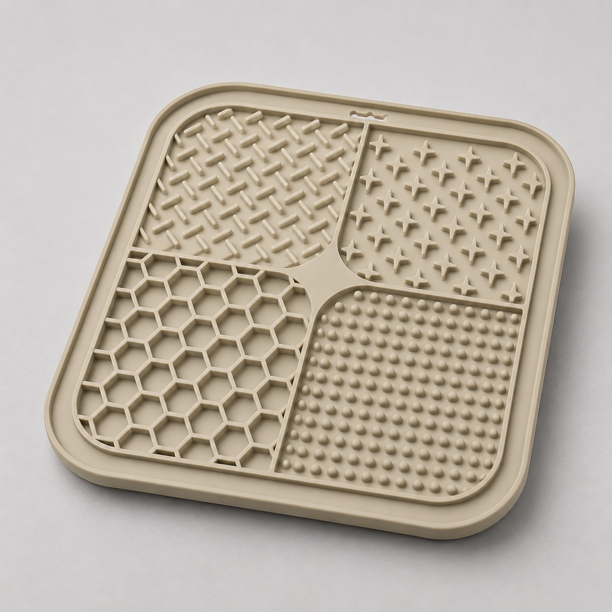 Stone dog lick silicone mat with textured surface on a light gray background