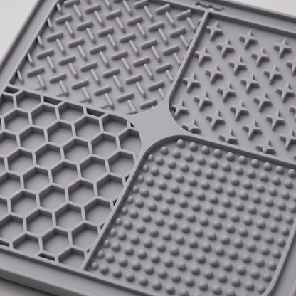 Grey dog lick textured mat with various patterns