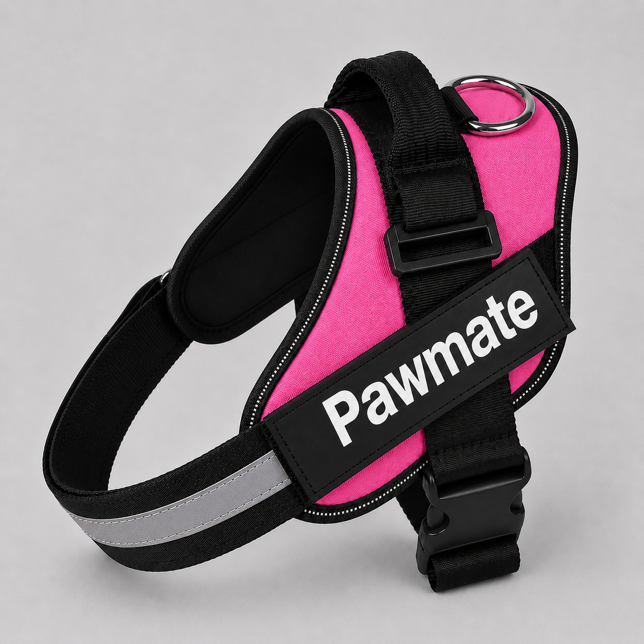 Pink dog harness with black straps on a gray background