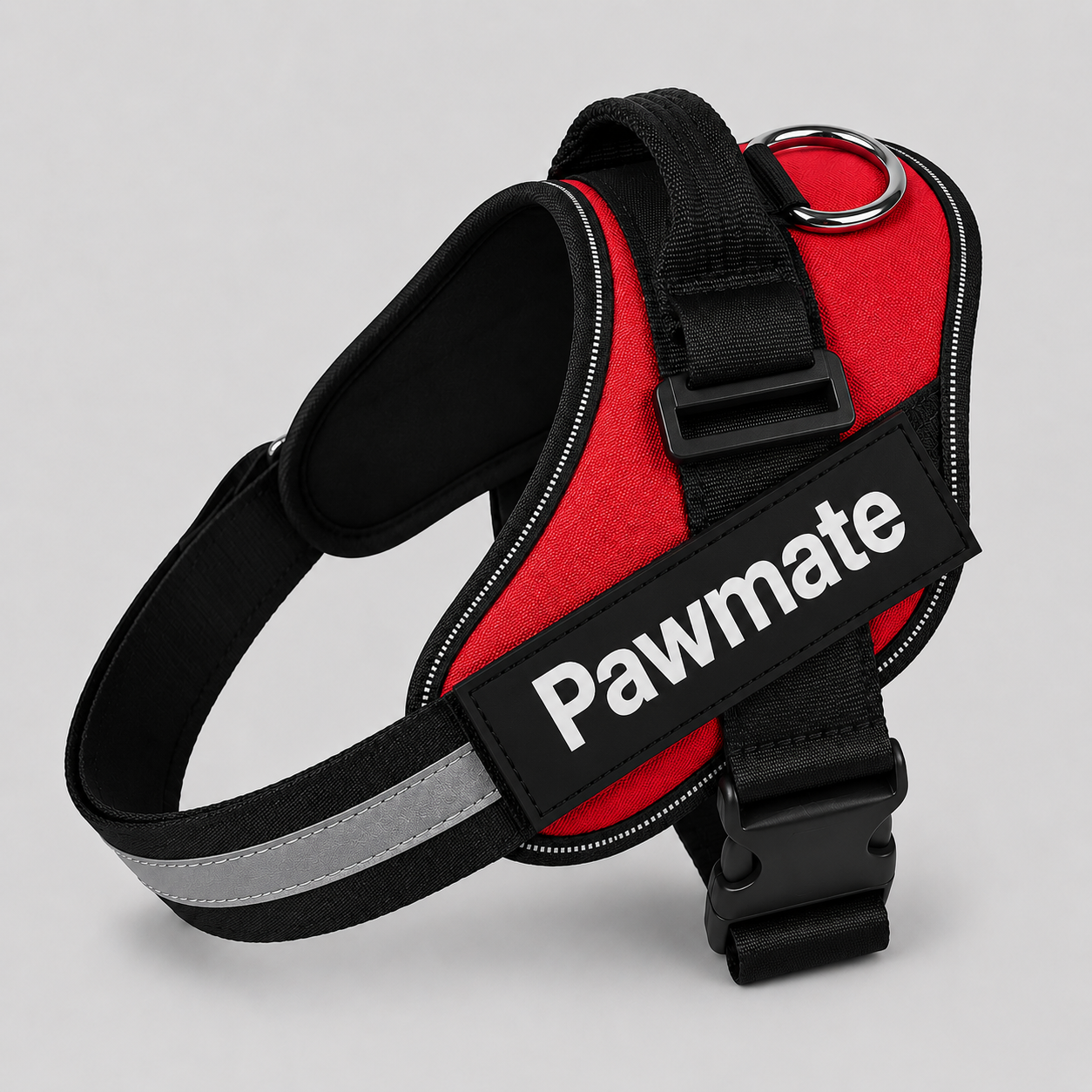 Red dog harness with black straps and reflective strip on a gray background