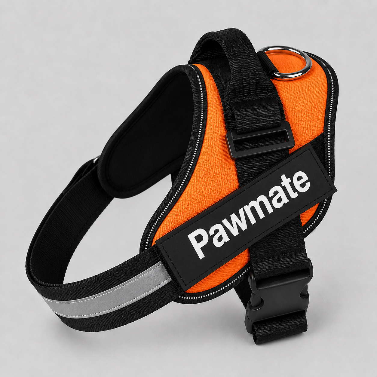 Orange and black dog harness with reflective strip on a gray background