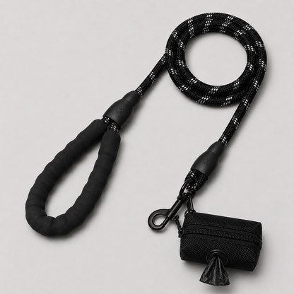Black dog leash with a dog waste pouch on a light gray background