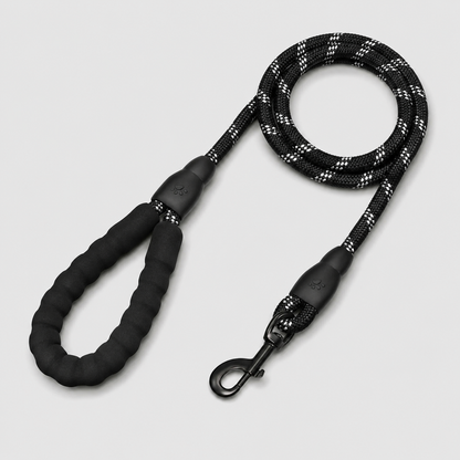 Black dog leash with reflective pattern on a light gray background