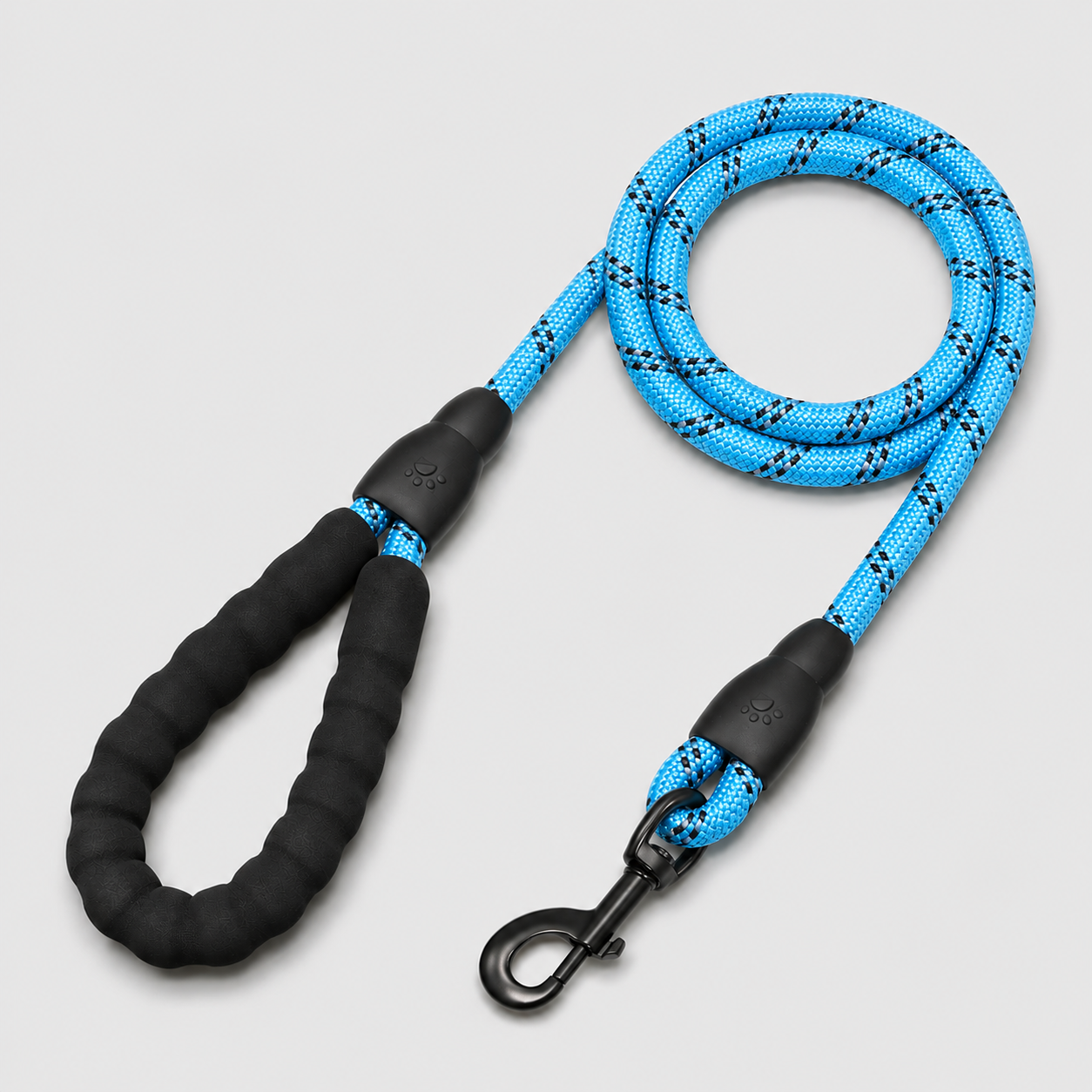 Blue and black dog leash on a light gray background