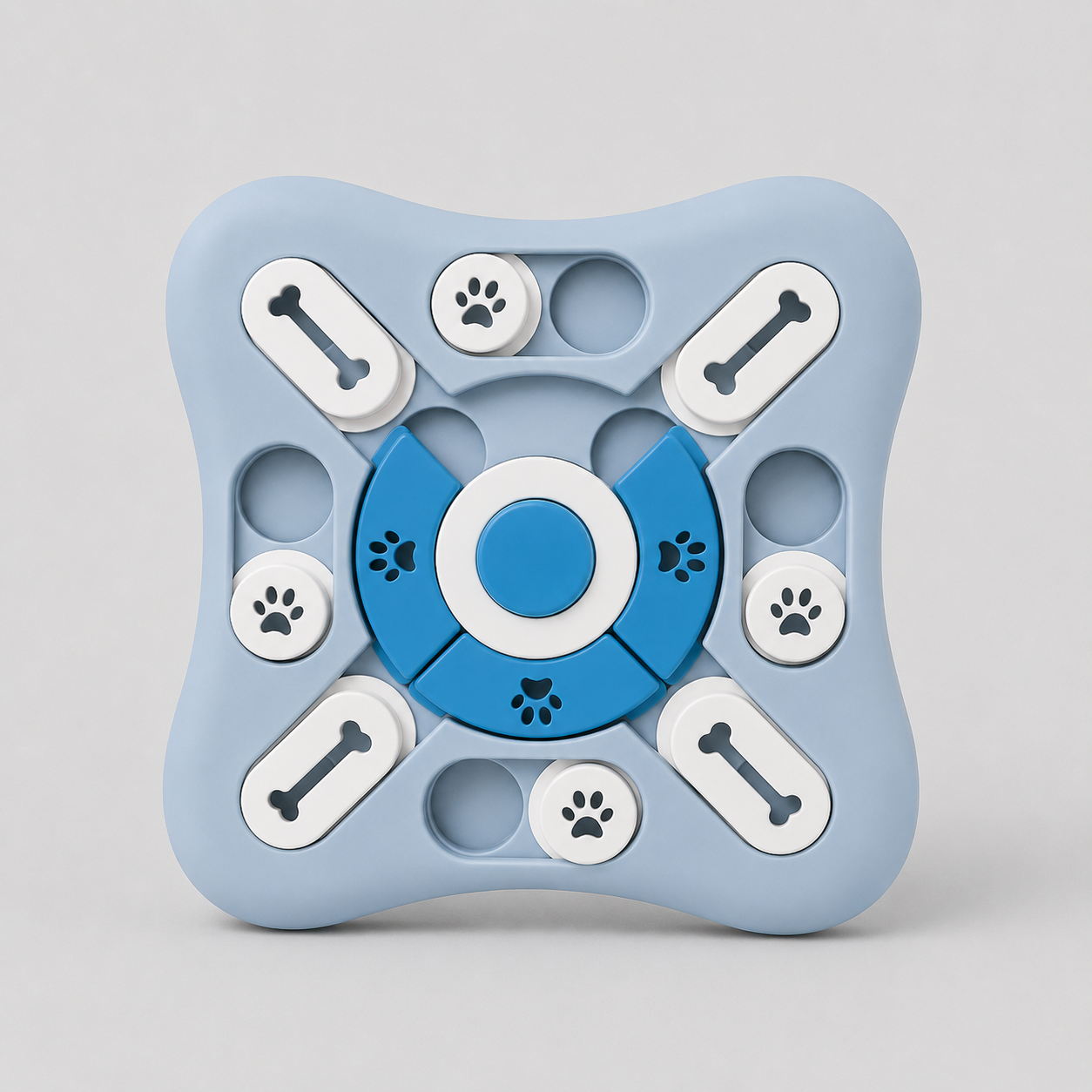 Blue and white puzzle toy for dogs on a grey background