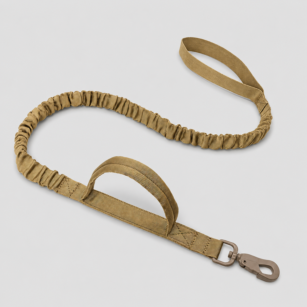 Brown dog leash with handle and clip on a light grey background