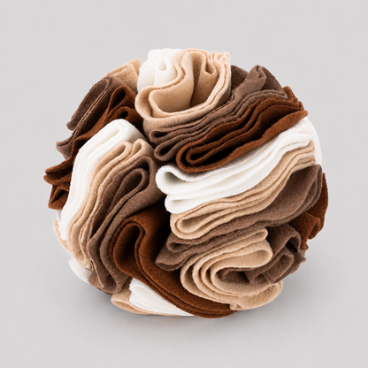 Stack of folded socks in brown, beige, and white on a light grey background