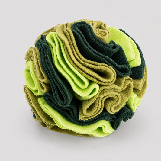 Ball of green and brown fabric swatches on a light grey background