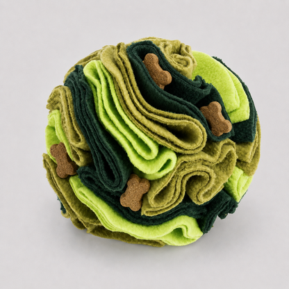 Stack of green and brown folded fabric with dog bone shapes on a light grey background