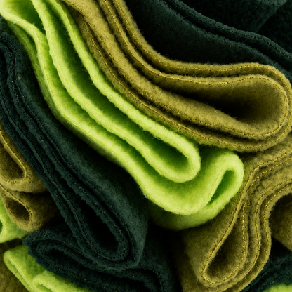 Stack of green and brown folded fleece zoomed in