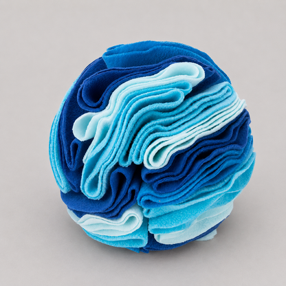 Stack of blue and white felt on a grey background