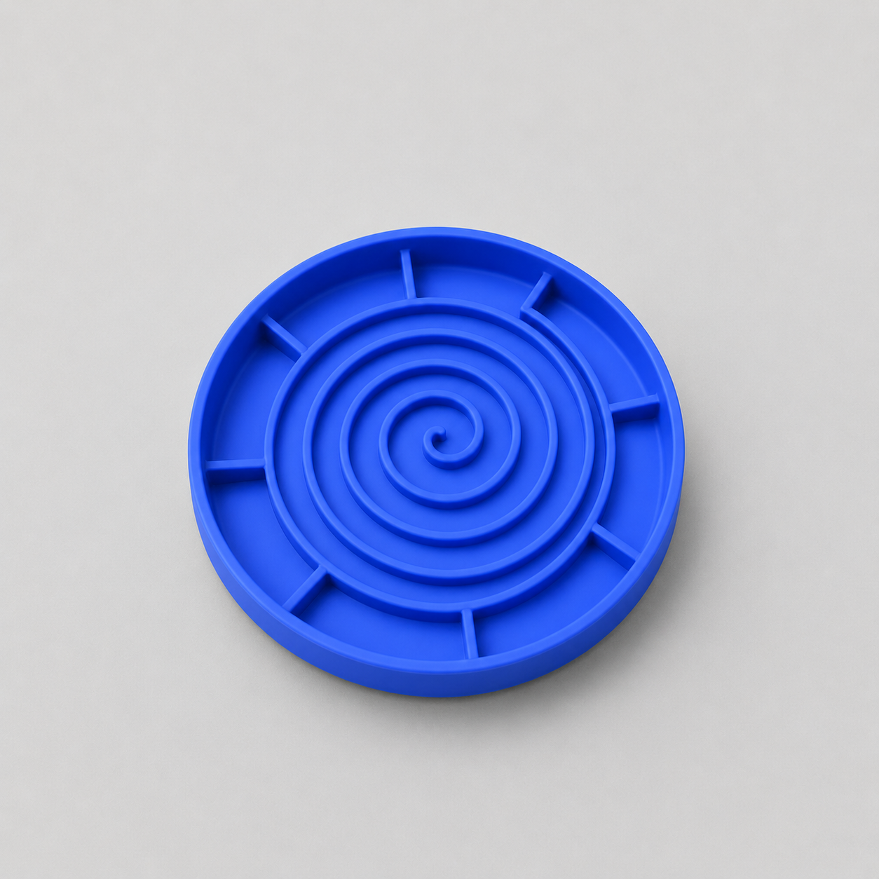 Cobalt Blue silicone slow feeder dog bowl on a light grey background