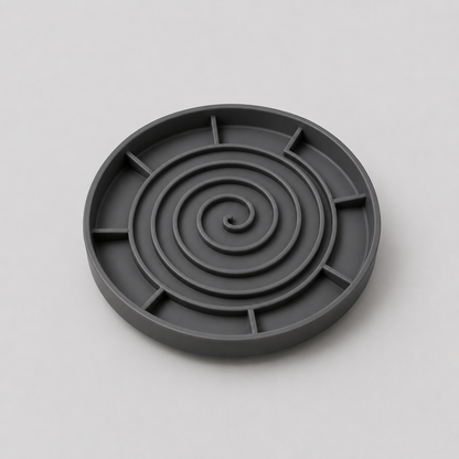 Grey silicone slow feeder dog bowl on a light grey background