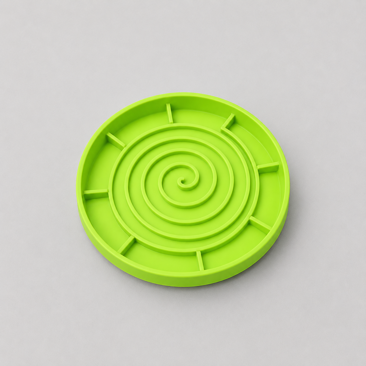 Lime Green slow feeder dog bowl on a light grey background